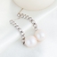 Show details for 16 Inch White Dangle Earrings in Flattering Style