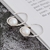 Picture of Stylish Small White Stud Earrings