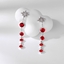 Show details for Recommended Red Platinum Plated Dangle Earrings from Top Designer