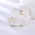 Picture of Filigree Small White Stud Earrings