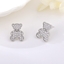 Show details for Need-Now White Copper or Brass Stud Earrings from Editor Picks