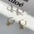 Picture of Delicate White Clip On Earrings with No-Risk Return