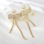 Show details for Need-Now White Gold Plated Dangle Earrings from Editor Picks