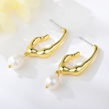 Show details for Classic White Dangle Earrings of Original Design