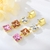 Picture of Low Cost Gold Plated Artificial Crystal Dangle Earrings with Low Cost