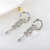 Picture of Purchase Platinum Plated Dubai Dangle Earrings Exclusive Online