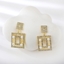 Show details for Delicate White Dangle Earrings in Flattering Style