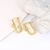 Picture of Designer Gold Plated White Huggie Earrings with Easy Return